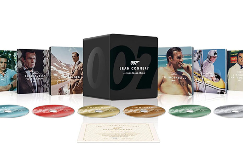 As clássicas aventuras de James Bond estreladas por Sean Connery finalmente ganharão uma versão em 4K Ultra HD Blu-ray, um verdadeiro presente para os fãs da franquia. O lançamento acontece no dia 10 de junho de 2025 e trará um conjunto especial com seis Steelbooks, cada um apresentando uma imagem do icônico ator em suas respectivas películas. Além disso, cada cópia do Steelbook será acompanhada de um certificado de autenticidade numerado. Coleção Steelbook de James Bond com Sean Connery em 4K Blu-ray